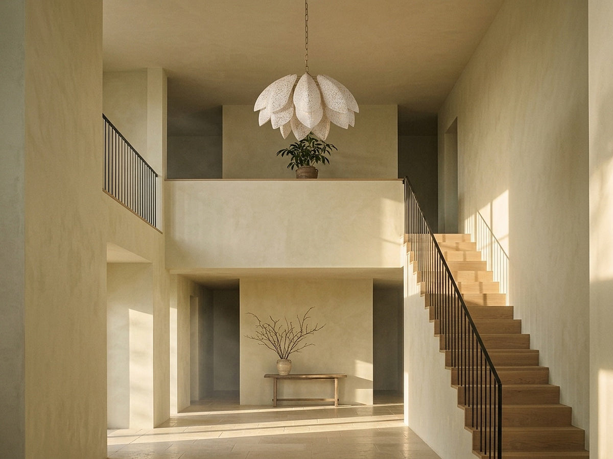 Chandelier hanging high in a double-height entrance hall