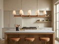 Hastings Linear Chandelier above a white oak kitchen island