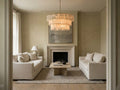 Verna Round Chandelier in a living room with a fireplace