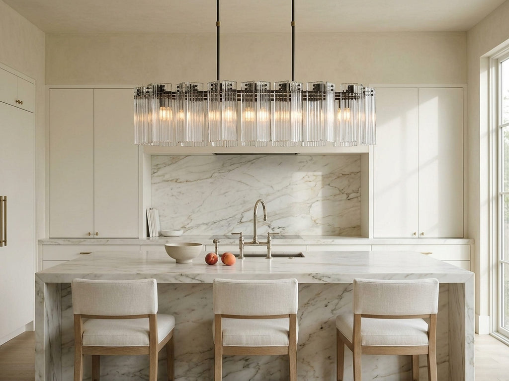 Delsie Oval Chandelier above a marble kitchen island